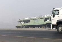 Trailer carrying electric cars overturns in Nawabshah