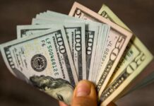 Rupee ascend continues as dollar slips to one-year low