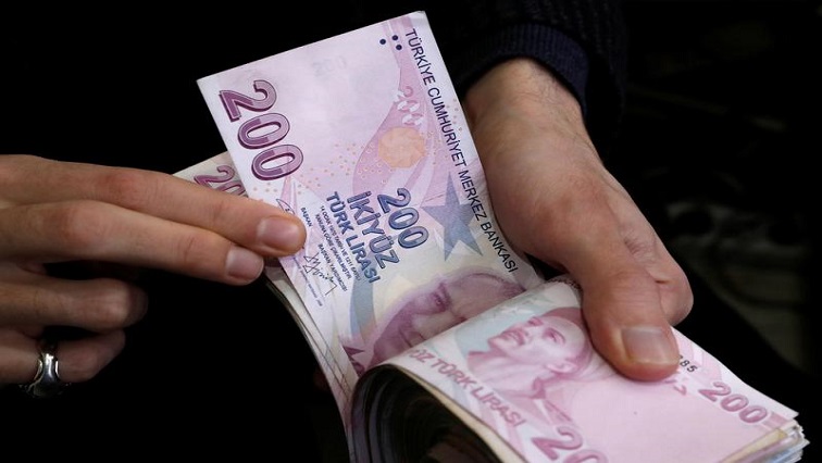 Turkish lira plunges to near record low after Erdogan sacks central bank chief