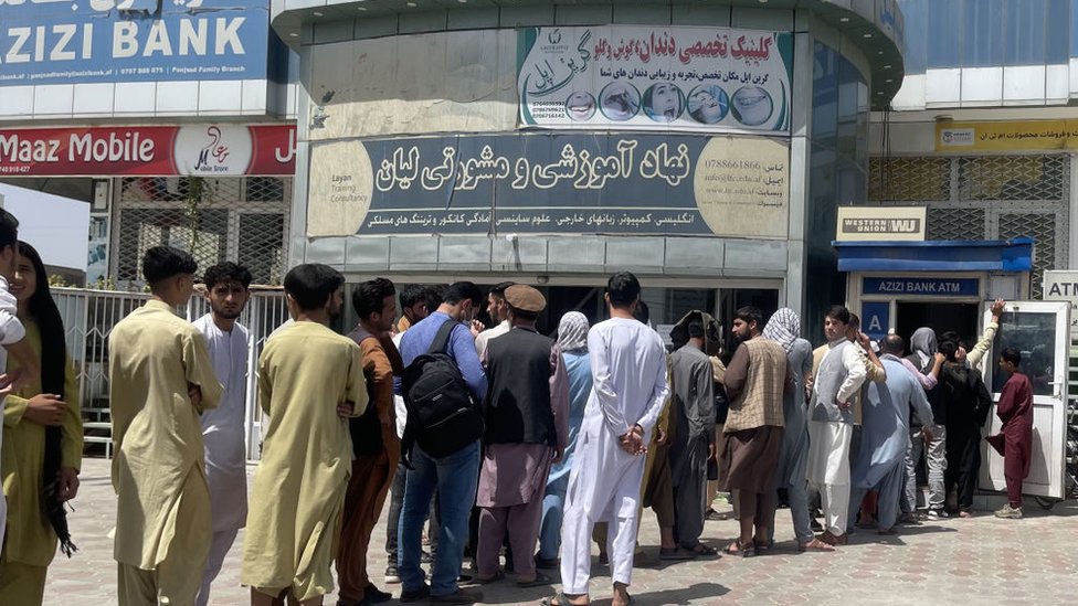Afghanistan central bank board member urges Biden, IMF to release funds
