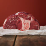 Presentetion raw angus leg steak craft paper