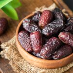 dried-dates-in-wooden-bowl-royalty-free-image-1640107942