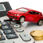 car and calculator. rising costs for buying a car, leasing, work