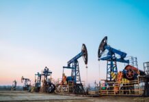 Oil prices fall after hitting five-month highs