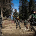 Indian security personnel at the site of the attack in Baisaran near Pahalgam
