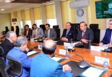 Finance minister says climate-driven flooding is weighing on Pakistan’s economic growth