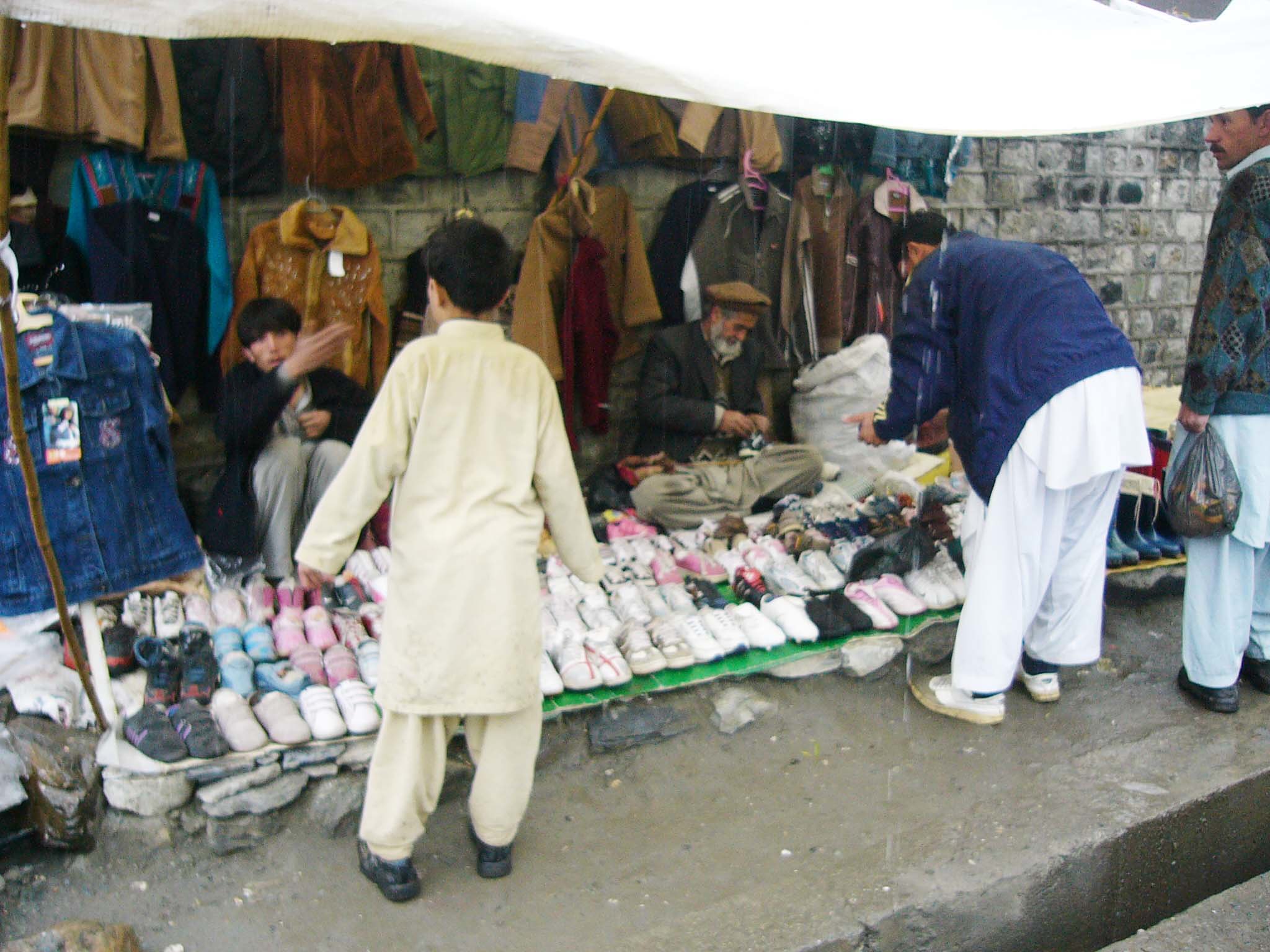How big is the landa bazaar, and is it strangling local shoe manufacturers?